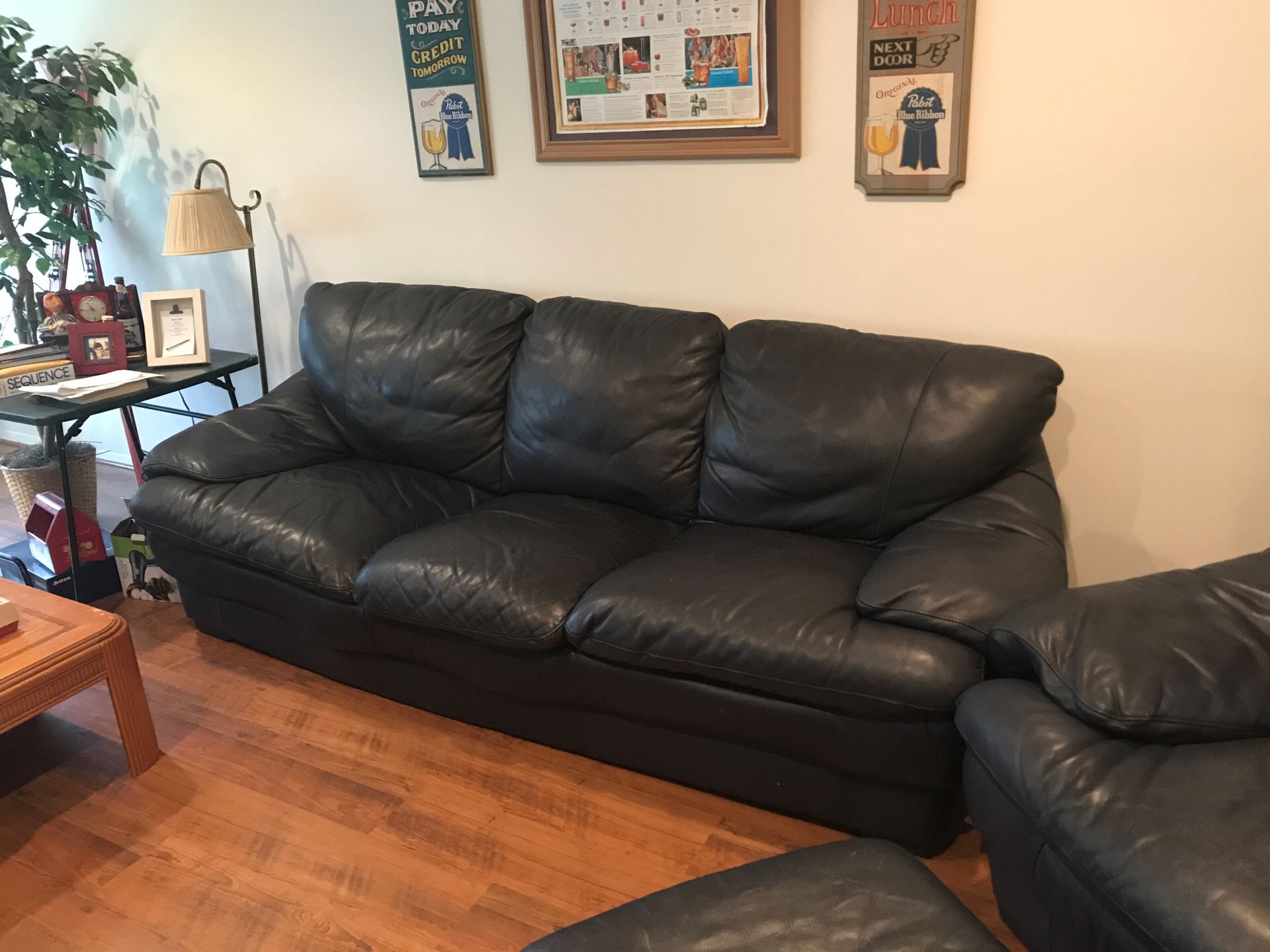 Leather Couch and Chair Combo $200 Cash or Check Only Price Negotiable. Need to Sell by end of May!