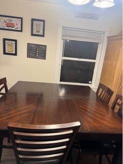 Dining table 4 chairs and a bench seat