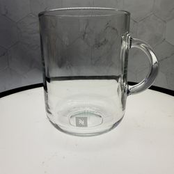 (1) Nespresso Vertuo Coffee Mug, crafted from tempered glass and branded with the Nespresso logo.