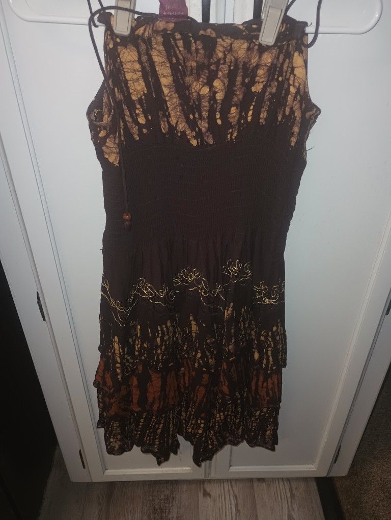 Dress That Is Free Size, Made By Fashion Terminal Inc Out Of New York. It Is A Designer Nice With Elastic Middle And Zig Zag Flares