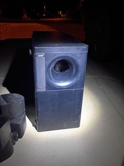 Bose surround with 4 satellite speakers and subwoofer