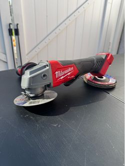 Milwaukee 4 1/2 in-5in. grinder.