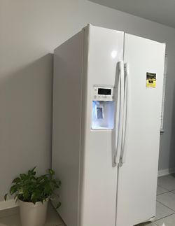 White Side-by-Side Refrigerator with Ice and Water Dispenser