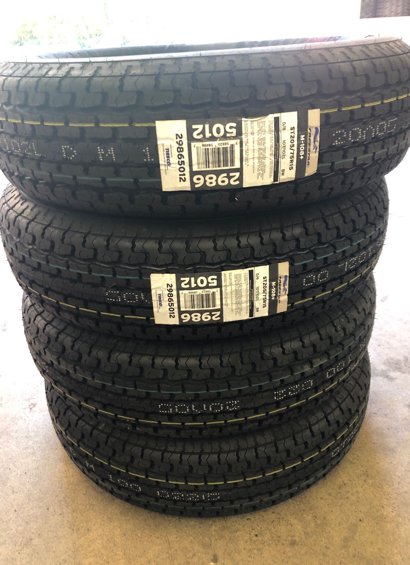 Set of 4 st205/75/15. Trailer tires