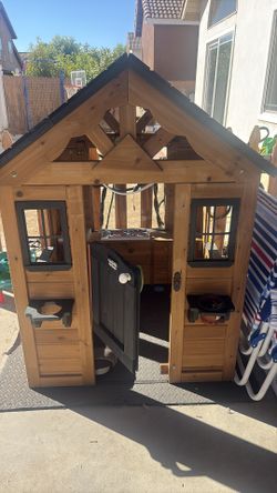 Wooden playhouse in great condition