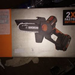 Works Chainsaw, Battery And Charger 