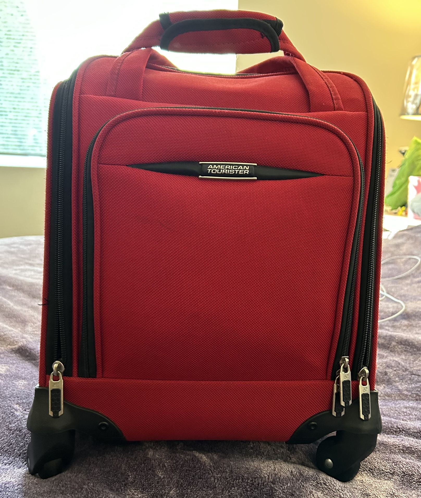 American Tourister Rolling Carry On Suitcase