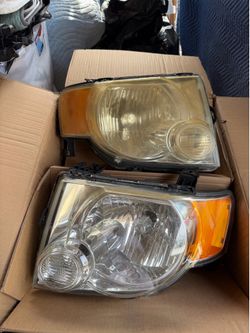 2007-2012 ford escape headlight assembly’s left and right.