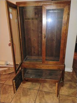 Antique wood 8 gun cabinet