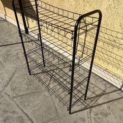 4 Tier black metal wire shelving unit a shoe rack, $10