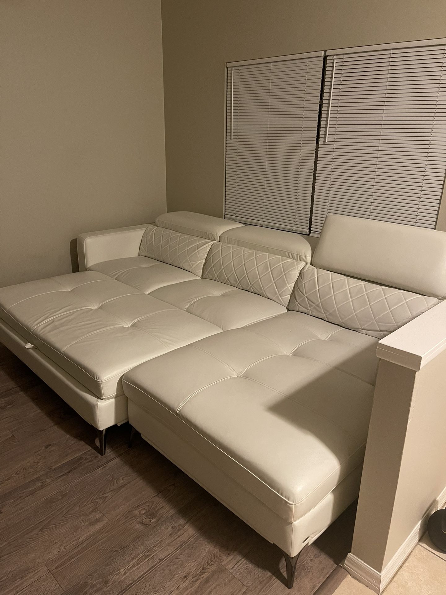 White Sectional + Ottoman