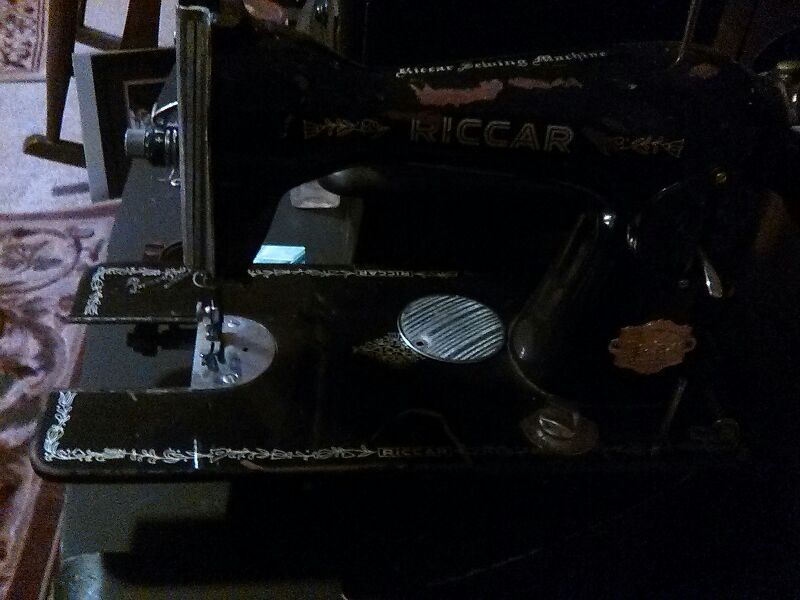 Riccar push perked sewing machine.