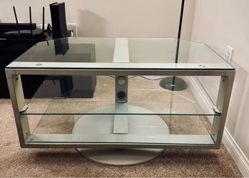 Rotating Glass and Metal TV Stand with Glass Shelves