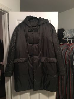 Very stylish Brand New from Italy, dark green coat, size L