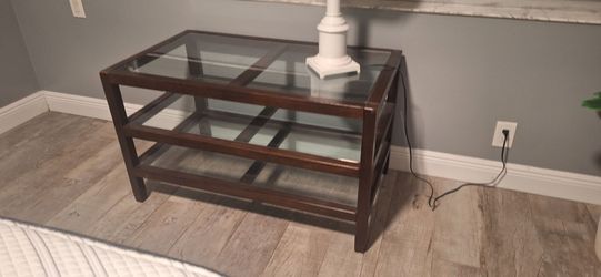Glass table with wood frame