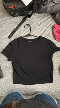 2 black shirts with round neck lining