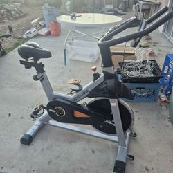 YOSUDA indoor cycling stationary exercise bike, featuring a durable steel frame and a smooth belt drive system. 