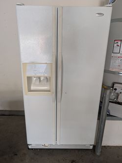 Whirlpool side by side fridge and freezer