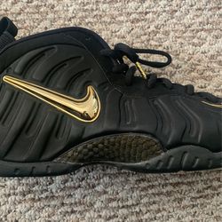 Black and gold top foamposites size 13