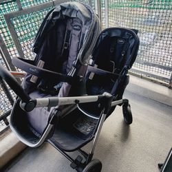 Evenflo Pivot EXPAND. Double Stroller With Car Seat And Base