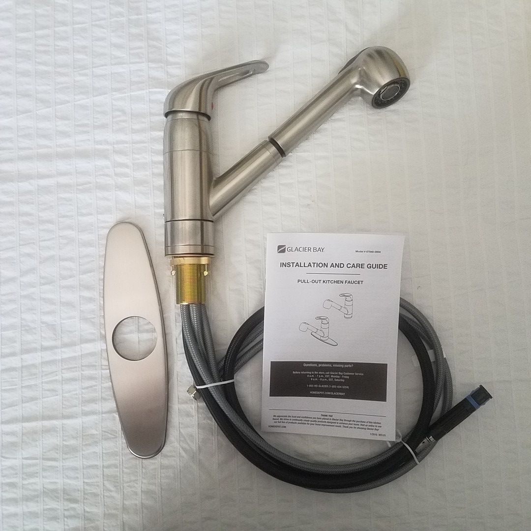 Brand new Glacier Bay pull down spray kitchen faucet brushed nickel