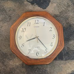 Citizen Quartz octagonal wood-frame wall clock. 