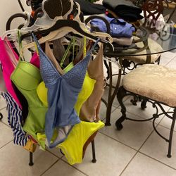 NEW SHIRTS    TSHIRTS NEW BATHING SUITE LADIES PANTS  VICTORIA SECRETS  GOOD CONDITION ALSO NEW WITH TICKETS LADIES SHOES   ALL FOR ONE DOLLAR EACH