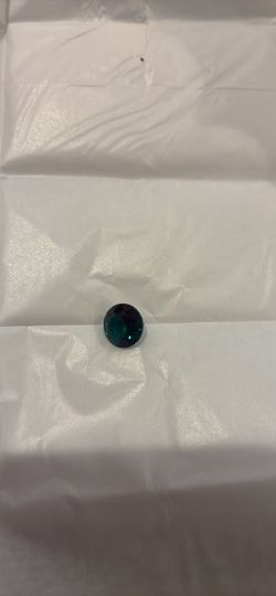 Oval Cut Deep Teal Gemstone emerald igi certified
