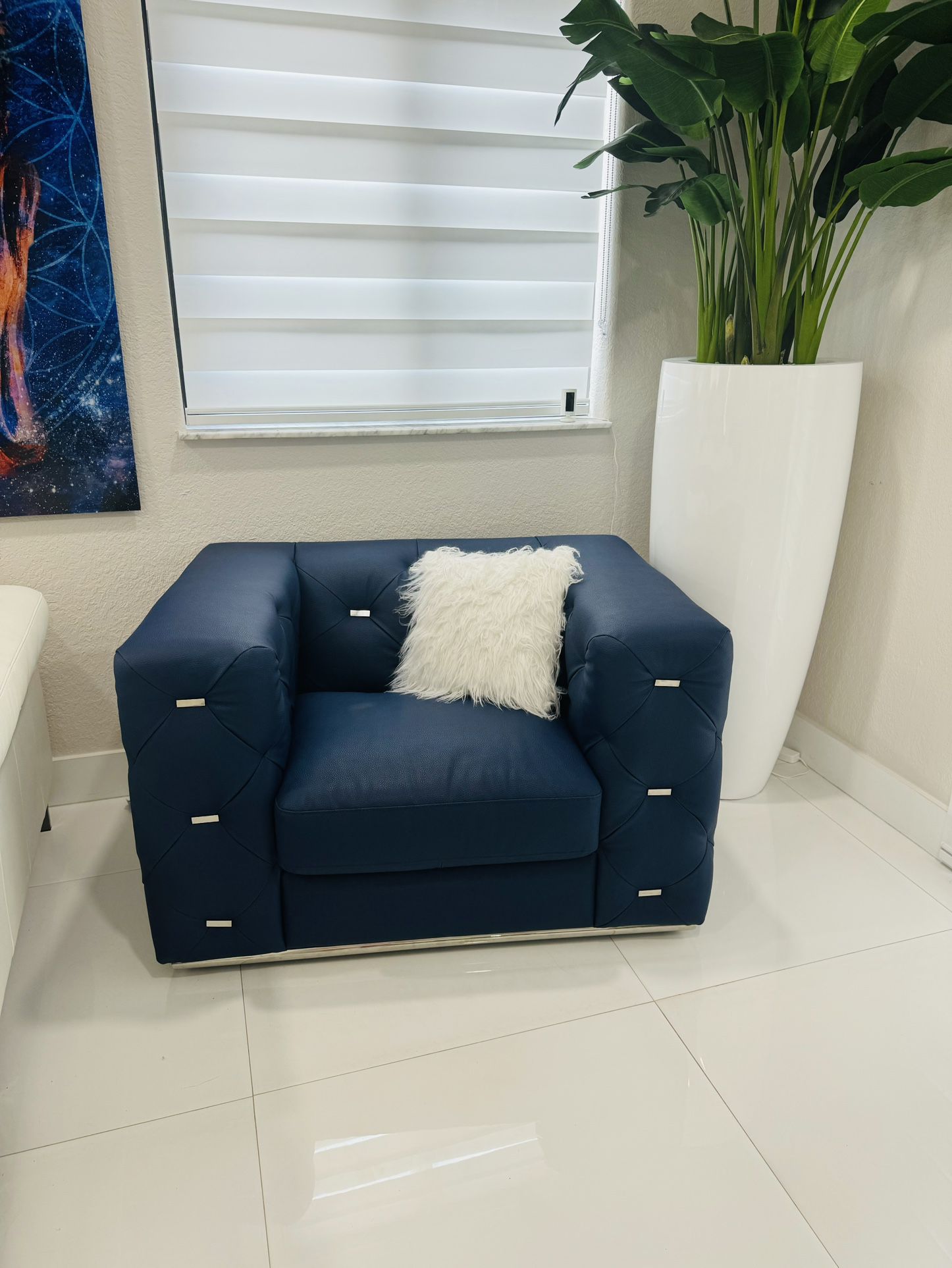 Wide dark blue mordern chair from el Dorado furniture