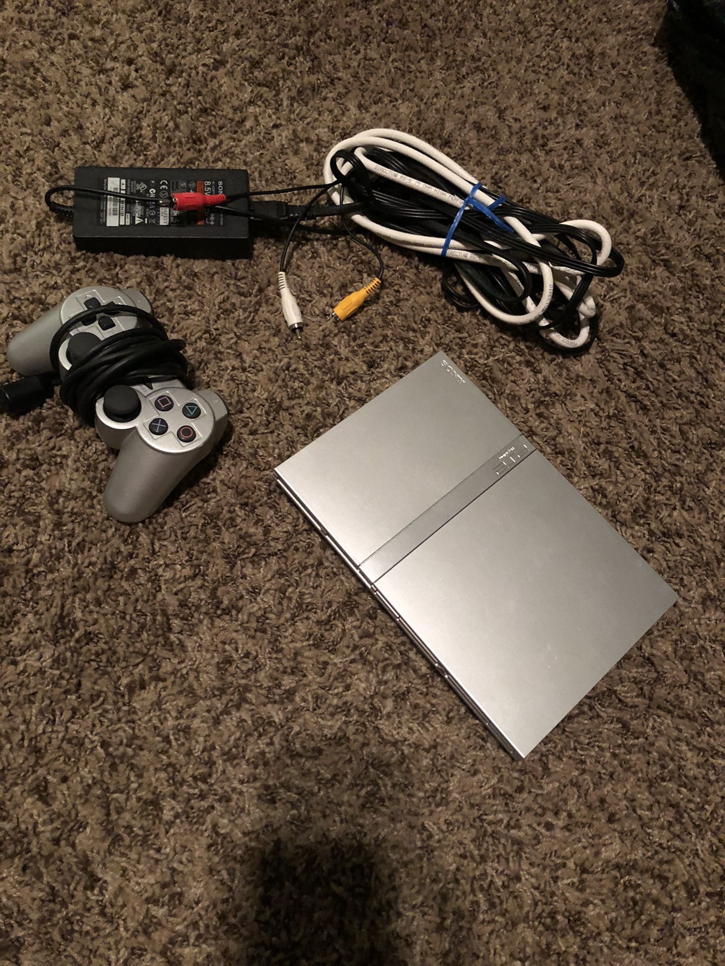 PS2 - w/ carry bag, microphone, and dance pad attachments