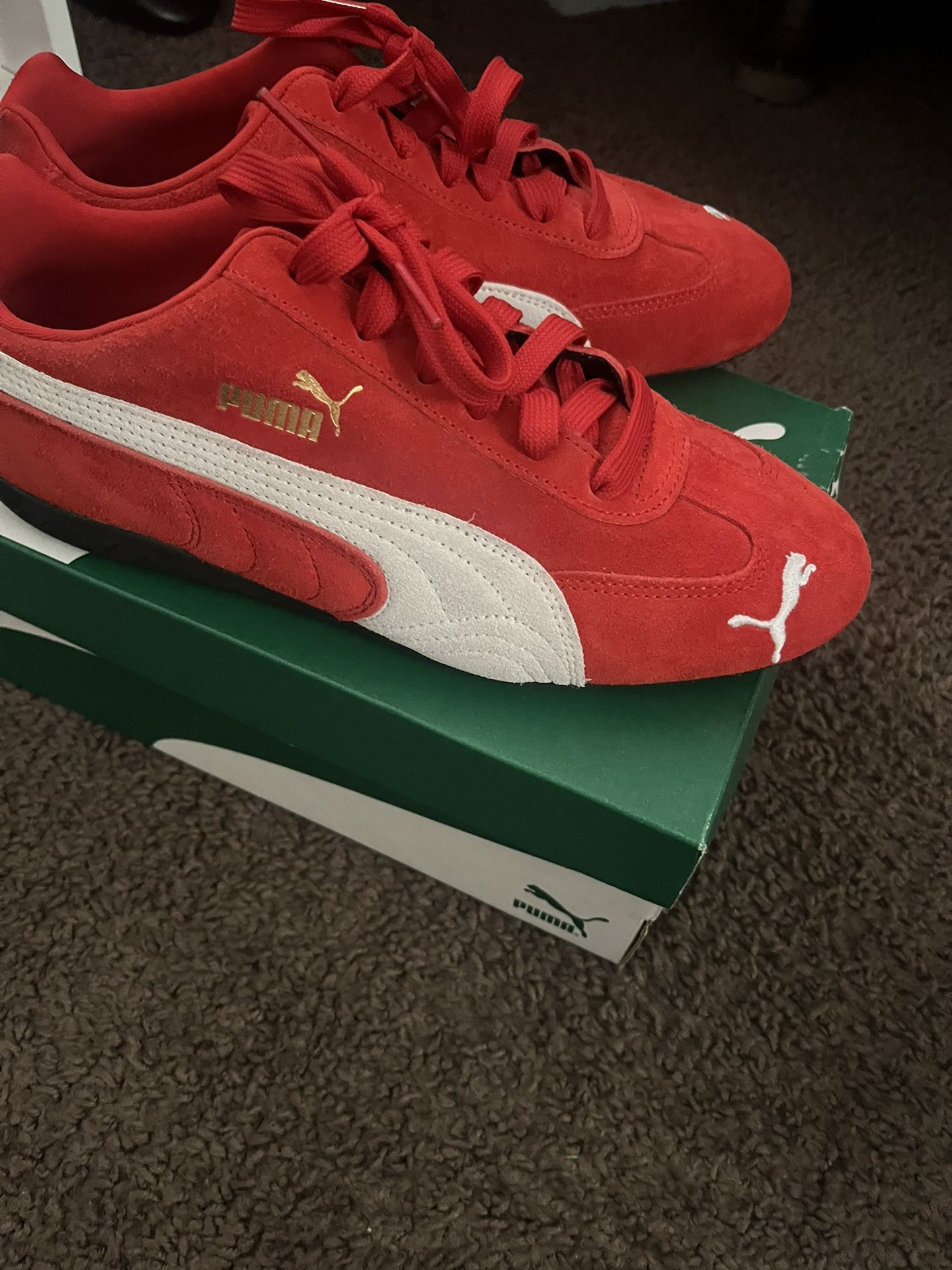 Red men's puma speedcats