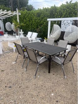 Outdoor Patio Aluminum Table with 6 Aluminum Stackable NEW Chairs