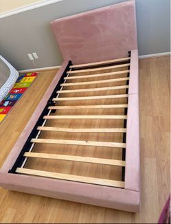 Twin upholstered bed frame pink