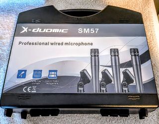 Wireless microphone system with three SM-57 microphones, two transmitters and one receiver