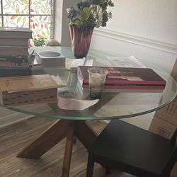 Gently used glass round table