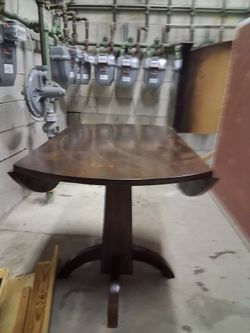 Dark Wood Round Pedestal Dining Table