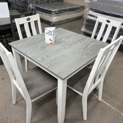 $399 DINNER TABLE AND CHAIRS 