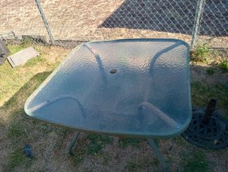 Outdoor patio table with umbrella stand