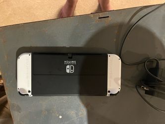 Like new!  Nintendo Switch OLED White with Dock