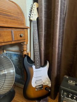 Squier Debut Series Stratocaster and Fender Amp
