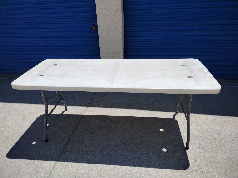 Heavy Duty Table 6 ft Leg Folding Table $60 each (Umbrella Not Included)