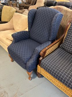 Blue wingback recliner chair (in store)