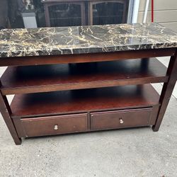 Brown tv stand with a Faux Marble Top 