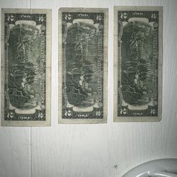 three two-dollar bills