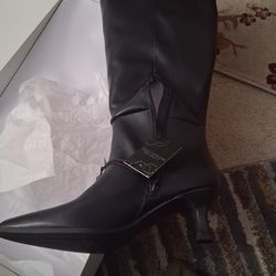 Boots. Below knee.  Wide calf. New .  Sz 7 or 9
