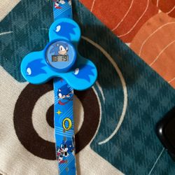 Reloj Sonic  $12.00  Ase Spin  Arriba 