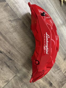LAMBORGHINI URUS FRONT LEFT BRAKE CALIPER RED CARBON CERAMIC CARBOCERAMICI 