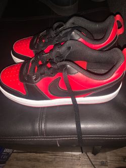 Red and black Nikes