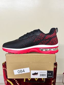 G WEST,  size 8, black and red shoes.