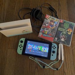 Nintendo Switch Plus 5 Games 